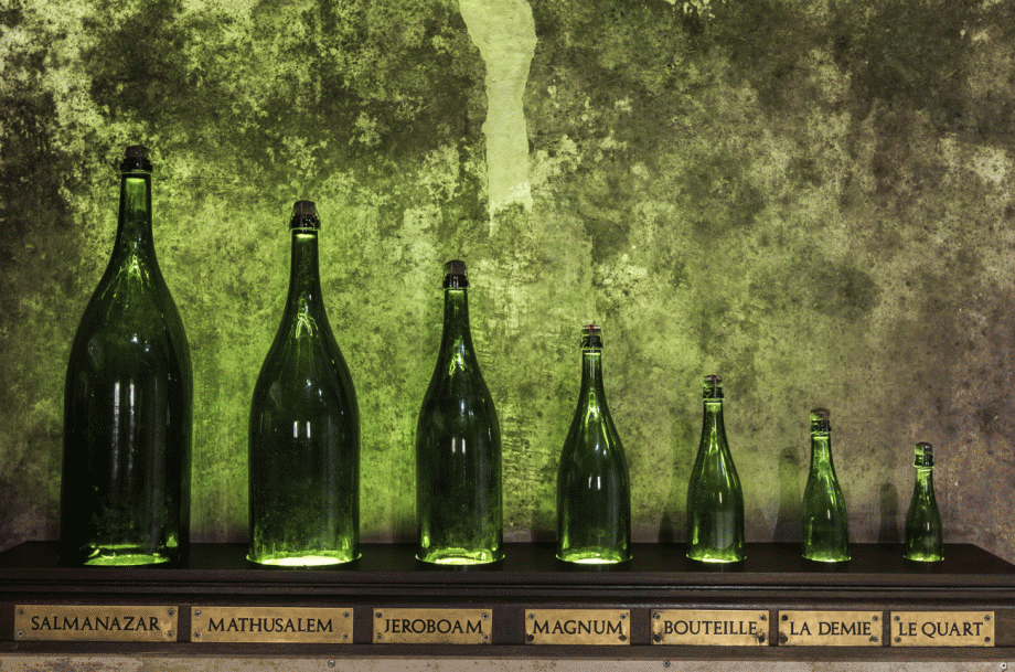 Large-format Champagne bottles on display, from Salmanazar down to Le Quart